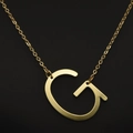 Elegant gold letter G pendant necklace with polished finish on a thin cable chain - Gold G