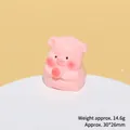 Macro view of cute pink resin pig figurine holding a peach, size 30x26mm and 14.6g - Peach Eating Pink Pig
