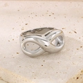 Polished silver infinity symbol stainless steel wide band ring on stone - 13mm Steel Infinity Style