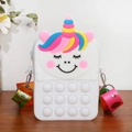 Unicorn pop it silicone crossbody bag for girls with colorful strap on wooden background - White