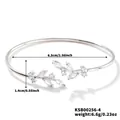 Detail view of willow leaf open cuff bracelet with dimensions 6.5cm and zircon inlays - White K White Diamond