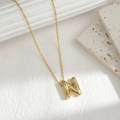 Minimalist gold necklace featuring a chubby balloon style letter N pendant for women - Letter N