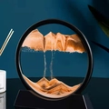 Moving sand art piece with black frame and golden brown flowing mountain landscape - 7 Inch Round Yellow