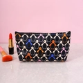 Cosmetic bag with colorful penguin pattern and zipper closure on marble surface - Black Penguin