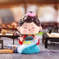Tang Dynasty girl figurine in red and blue hanfu painting with a brush on a scroll - Painting
