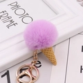 Close-up of mini ice cream keychain with purple faux fur pompom and waffle cone detail - Light Purple