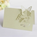 Laser cut hollow butterfly place card in light champagne pearlescent paper for weddings - Emerald Green