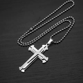 Close-up of a silver triple-layered cross pendant with bead chain on wood background - 60CM Bead Chain / Steel