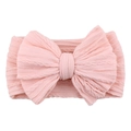 Pink nylon elastic headband for babies with a large jacquard textured bow - Light Pink