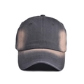 Detailed close-up of a vintage tie-dye baseball cap with gradient washed cotton texture - Gray