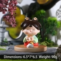 Tang style lady figurine resin ornament in traditional green and red attire - Gourd Holding Phone Holder