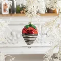 Chocolate dipped strawberry Christmas glass ornament with white stripes on snowy pine branch - Strawberry Glass Pendant