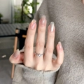 Close-up of nude gradient cat-eye press-on nails with silver diamond ring detail - Twinkling Stars (BS2108)