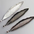 Leaf-shaped alloy incense holders in silver, bronze, and copper with realistic textures - Cyan Bronze Leaf