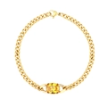 Detail of a golden Cuban link bracelet featuring a large oval yellow gemstone and lobster clasp - B2032-Gold Yellow Oval Gemstone Bracelet