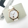 Close-up of rose gold cat ear watch with white dial and cute feline motif on strap - Watch Only / White
