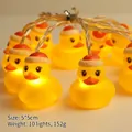 Christmas duck LED string lights with yellow ducks in Santa hats and warm glow - Nightcap Duck (1.8m 10 LEDs - 2AA Constant Light Battery Box)