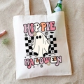Detail of Hippie Halloween ghost print on cream canvas tote bag in a beach setting - Hippie Halloween
