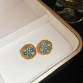 Macro shot of octagonal gold earrings with colorful enamel flowers in a jewelry box - Silver Earring Post Rhombus Flower Enamel Zircon Stud Earrings