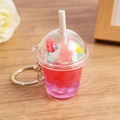 Pink and purple miniature bubble tea keychain with bear gummy and white cream - Pink