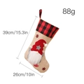 Beige burlap Christmas stocking featuring a gnome motif with red and black plaid trim - Pentagram Male Style