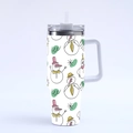 Detail of 40oz white insulated tumbler featuring repetitive cartoon snowman patterns - Style 8