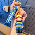 Cartoon fireman keychain in blue uniform with PVC wristlet and gold metal clasp - Firefighter-Blue