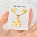 Golden spiral pendant necklace and stud earrings set on a stainless steel card - TT-066 (Spiral)