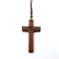 Detailed macro view of dark brown wooden cross pendant with vintage metallic bead and cord - Single Layer Cross / Coffee