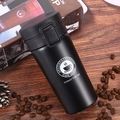 Black 304 stainless steel insulated coffee mug on wooden desk with coffee beans - 380ml / Gen 1 Twist Lid Style / Black