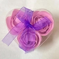Pink soap roses in a heart shaped clear box with a purple ribbon bow gift - Light Purple