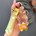 Llavero de oso amarillo con botella acrílica y correa de silicona a juego para bolsos - Oso de aceite amarillo
