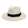 Close-up of cream Panama straw hat featuring a woven texture and black grosgrain ribbon band - Pure White