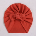 Orange baby turban hat with a large bow tie knot, made from soft knitted fabric texture - Orange Red (#6)