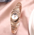 Luxury rose gold quartz watch with full sparkling crystals on pink satin background - Rose Gold Bracelet Watch