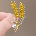 Golden wheat brooch with yellow crystal grains and a white pearl on khaki background - 356# Wheat Ear
