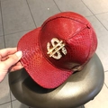 Red snake skin texture baseball cap featuring a large golden rhinestone dollar sign buckle - Red - Dollar Sign
