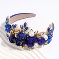 Detailed shot of handmade blue roses and faux pearls on a luxury baroque headband - Navy Blue
