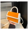 Chic orange and white color-block handbag with gold hardware and a detachable strap - Orange