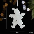 Sparkling white Christmas bear ornament with sequins and rhinestone on dark background - Santa Claus