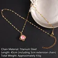 Golden rotating clover necklace with pink gemstone and zircon in titanium steel - Pink Cat Eye Stone Flower Style (A848)