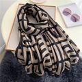 Vintage large color-block cotton linen scarf with geometric patterns on a table - Black Beige Geometric