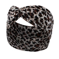 Detailed view of leopard print knotted headband with velvet texture and crisscross design - Beige Brown Leopard