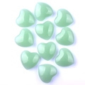 Set of ten heart-shaped green natural crystal stones with a smooth polished finish - Smelted Light Green Jade