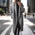 Women's long grey wool coat with double-breasted buttons and lapels in a street style - S / Gray