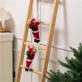 Detail of two Santa Claus figures climbing a rope ladder with green gift bags - 2-Person Ladder (60cm)