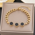 18k gold plated stainless steel bracelet featuring Cuban chain and black enamel discs - Gold Patchwork Black Disc Style (5272)