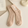 Warm apricot coral fleece socks for women featuring cozy plush texture and bow accents - One Size / Coffee