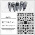 Macro detail of ultra-thin leopard and zebra print nail stickers with grey matte finish - Wild Text Animal Texture (1455)
