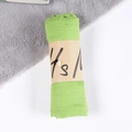 Grass green cotton linen scarf rolled with paper band on white and fur background - Fruit Green / One Size